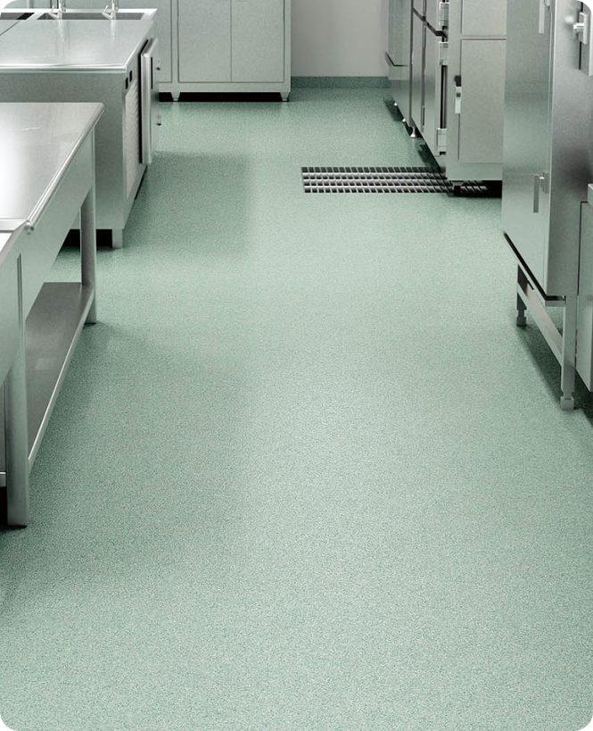 Green vinyl floor at kitchen school